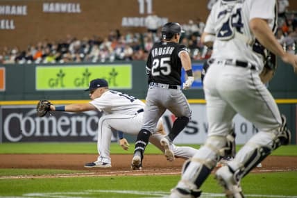 Sep 9, 2023; Detroit, Michigan, USA; Detroit Tigers first baseman Spencer Torkelson (20) catches the ball for an out on Chicago White Sox first baseman Andrew Vaughn (25) in the eighth inning at Comerica Park. Mandatory Credit: David Reginek-USA TODAY Sports