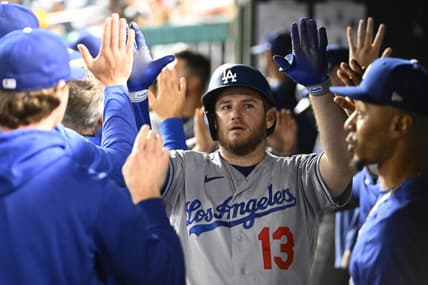 Sep 9, 2023; Washington, District of Columbia, USA; Los Angeles Dodgers third baseman Max Muncy (13) is congratulated by teammates after hitting a two run home run against the Washington Nationals during the eighth inning at Nationals Park. Mandatory Credit: Brad Mills-USA TODAY Sports
