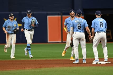 Sep 10, 2023; St. Petersburg, Florida, USA; Members of the Tampa Bay Rays celebrate after defeating the Seattle Mariners  at Tropicana Field. Mandatory Credit: Jonathan Dyer-USA TODAY Sports