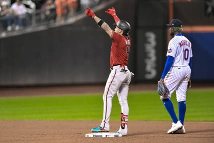 Sep 11, 2023; New York City, New York, USA; Arizona Diamondbacks second baseman Ketel Marte (4) reacts after hitting an RBI double against the New York Mets during the ninth inning at Citi Field. Mandatory Credit: John Jones-USA TODAY Sports