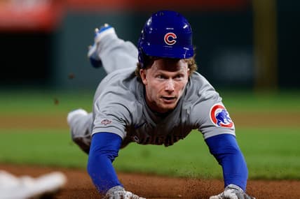 Sep 11, 2023; Denver, Colorado, USA; Chicago Cubs outfielder Pete Crow-Armstrong (52) attempts to steal third base in the seventh inning against the Colorado Rockies at Coors Field. Mandatory Credit: Isaiah J. Downing-USA TODAY Sports