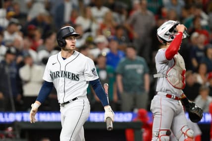 Sep 11, 2023; Seattle, Washington, USA; Seattle Mariners right fielder Jarred Kelenic (10) walks off the field after striking out to the Los Angeles Angels during the ninth inning at T-Mobile Park. Mandatory Credit: Steven Bisig-USA TODAY Sports