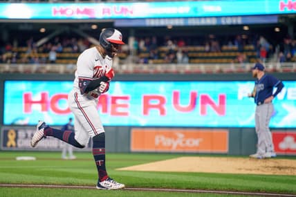 Sep 12, 2023; Minneapolis, Minnesota, USA; Minnesota Twins left fielder Willi Castro (50) hits a two run home run in the seventh inning against the Tampa Bay Rays at Target Field. Mandatory Credit: Matt Blewett-USA TODAY Sports