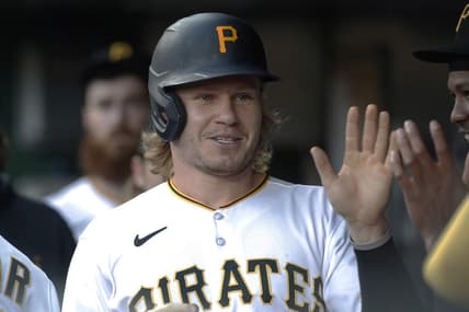 Sep 13, 2023; Pittsburgh, Pennsylvania, USA; Pittsburgh Pirates center fielder Jack Suwinski (65) celebrates in the dugout after scoring a run against the Washington Nationals during the first inning at PNC Park. Mandatory Credit: Charles LeClaire-USA TODAY Sports