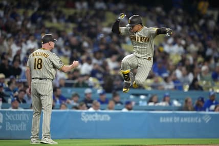 Sep 13, 2023; Los Angeles, California, USA; San Diego Padres left fielder Juan Soto (22) celebrates with third base coach and infield instructor Matt Williams (18) after hitting a home riun in the first inning against the Los Angeles Dodgers at Dodger Stadium. Mandatory Credit: Kirby Lee-USA TODAY Sports
