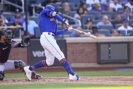 Sep 14, 2023; New York City, New York, USA; New York Mets center fielder Brandon Nimmo (9) hits an RBI double against the Arizona Diamondbacks during the third inning at Citi Field. Mandatory Credit: Gregory Fisher-USA TODAY Sports