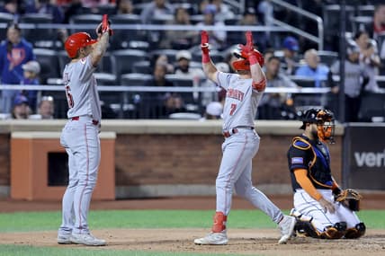 Sep 15, 2023; New York City, New York, USA; Cincinnati Reds first baseman Spencer Steer (7) celebrates his two run home run against the New York Mets with third baseman Nick Senzel (15) during the sixth inning at Citi Field. Mandatory Credit: Brad Penner-USA TODAY Sports