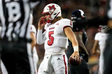 Miami (Oh) RedHawks quarterback Brett Gabbert (5) holds the ball between plays during the NCAA football game between the Cincinnati Bearcats and the Miami RedHawks at Nippert Stadium in Cincinnati on Saturday, Sept. 16, 2023.