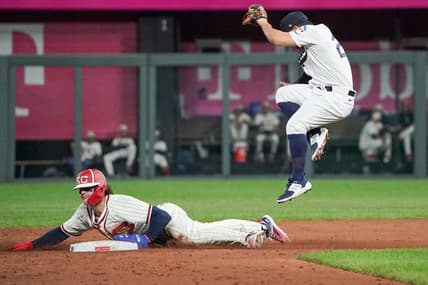 Sep 16, 2023; Kansas City, Missouri, USA; Houston Astros second baseman Jose Altuve (27) can   t make the tag as Kansas City Royals shortstop Bobby Witt Jr. (7) steals second base in the third inning at Kauffman Stadium. Mandatory Credit: Denny Medley-USA TODAY Sports