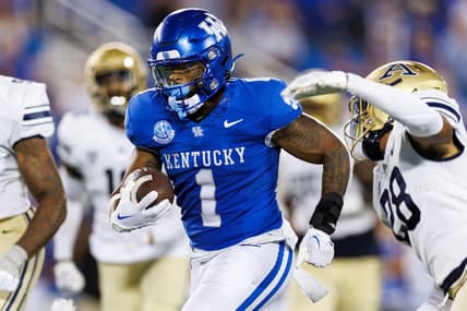 Sep 16, 2023; Lexington, Kentucky, USA; Kentucky Wildcats running back Ray Davis (1) carries the ball into the end zone and scores a touchdown during the fourth quarter against the Akron Zips at Kroger Field. Mandatory Credit: Jordan Prather-USA TODAY Sports