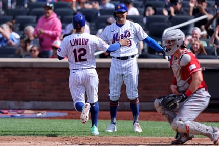 Sep 17, 2023; New York City, New York, USA; New York Mets shortstop Francisco Lindor (12) and designated hitter Brandon Nimmo (9) celebrate after scoring on a double by catcher Francisco Alvarez (not pictured) during the third inning against the Cincinnati Reds at Citi Field. Mandatory Credit: Brad Penner-USA TODAY Sports
