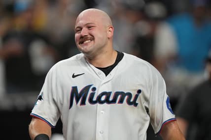 Sep 19, 2023; Miami, Florida, USA;  Miami Marlins third baseman Jake Burger (36) gets dunked by teammates after hitting the game winning RBI single in the ninth inning against the New York Mets at loanDepot Park. Mandatory Credit: Jim Rassol-USA TODAY Sports