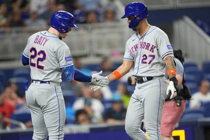 Sep 20, 2023; Miami, Florida, USA;  New York Mets designated hitter Mark Vientos (27) is congratulated by third baseman Brett Baty (22) after hitting a solo home run in the second inning against the Miami Marlins at loanDepot Park. Mandatory Credit: Jim Rassol-USA TODAY Sports