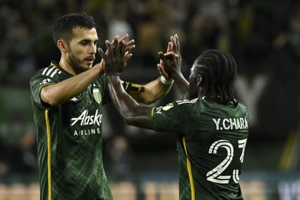 Sep 20, 2023; Portland, Oregon, USA; Portland Timbers midfielder Cristhian Paredes (22) celebrates with defender Oskar Agren (23) after the win against the San Jose Earthquakes at Providence Park. Mandatory Credit: Troy Wayrynen-USA TODAY Sports