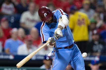 Sep 21, 2023; Philadelphia, Pennsylvania, USA; Philadelphia Phillies right fielder Nick Castellanos (8) hits a two RBI single during the first inning against the New York Mets at Citizens Bank Park. Mandatory Credit: Bill Streicher-USA TODAY Sports