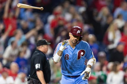 Sep 21, 2023; Philadelphia, Pennsylvania, USA; Philadelphia Phillies right fielder Nick Castellanos (8) tosses his bat after hitting a home run during the sixth inning against the New York Mets at Citizens Bank Park. Mandatory Credit: Bill Streicher-USA TODAY Sports