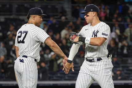 Sep 22, 2023; Bronx, New York, USA; New York Yankees right fielder Aaron Judge (99) celebrates with designated hitter Giancarlo Stanton (27) after defeating the Arizona Diamondbacks at Yankee Stadium. Mandatory Credit: Vincent Carchietta-USA TODAY Sports