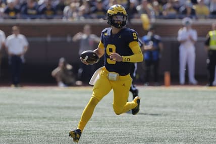 Sep 23, 2023; Ann Arbor, Michigan, USA;  Michigan Wolverines quarterback J.J. McCarthy (9) runs the ball against the Rutgers Scarlet Knights in the first half at Michigan Stadium. Mandatory Credit: Rick Osentoski-USA TODAY Sports
