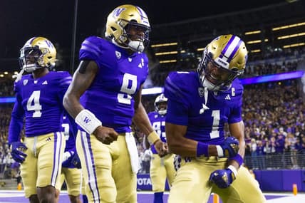 Sep 23, 2023; Seattle, Washington, USA; Washington Huskies wide receiver Rome Odunze (1) celebrates with quarterback Michael Penix Jr. (9) after returning a punt for a touchdown during the first quarter at Alaska Airlines Field at Husky Stadium. Mandatory Credit: Joe Nicholson-USA TODAY Sports