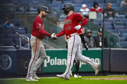 Sep 24, 2023; Bronx, New York, USA; Arizona Diamondbacks first baseman Christian Walker (53) is greeted by Arizona Diamondbacks shortstop Jordan Lawlar (10) after scoring on a two RBI single by Arizona Diamondbacks third baseman Evan Longoria (not pictured) during the seventh inning against the New York Yankees at Yankee Stadium. Mandatory Credit: John Jones-USA TODAY Sports