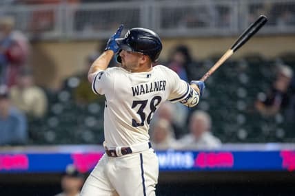 Sep 26, 2023; Minneapolis, Minnesota, USA; Minnesota Twins left fielder Matt Wallner (38) hits a grand slam against the Oakland Athletics in the first inning at Target Field. Mandatory Credit: Jesse Johnson-USA TODAY Sports