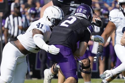 Sep 30, 2023; Evanston, Illinois, USA; Penn State Nittany Lions linebacker Kobe King (41) sacks Northwestern Wildcats quarterback Ben Bryant (2) during the first half at Ryan Field. Mandatory Credit: David Banks-USA TODAY Sports