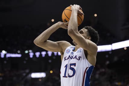 Mar 10, 2023; Kansas City, MO, USA; Kansas Jayhawks guard Kevin McCullar Jr. (15) shoots the ball against the Iowa State Cyclones in the second half at T-Mobile Center. Mandatory Credit: Amy Kontras-USA TODAY Sports