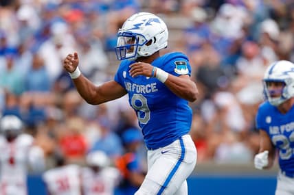 Sep 2, 2023; Colorado Springs, Colorado, USA; Air Force Falcons quarterback Zac Larrier (9) celebrates after scoring a touchdown in the third quarter against the Robert Morris Colonials at Falcon Stadium. Mandatory Credit: Isaiah J. Downing-USA TODAY Sports