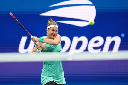 Sep 2, 2023; Flushing, NY, USA; Marie Bouzkova of Czech Republic hits to Ons Jabeur of Tunisia on day six of the 2023 U.S. Open tennis tournament at USTA Billie Jean King National Tennis Center. Mandatory Credit: Danielle Parhizkaran-USA TODAY Sports
