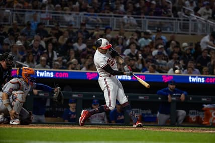 Sep 8, 2023; Minneapolis, Minnesota, USA; Minnesota Twins shortstop Carlos Correa (4) hits a solo home run during the fourth inning against the New York Mets at Target Field. Mandatory Credit: Jordan Johnson-USA TODAY Sports