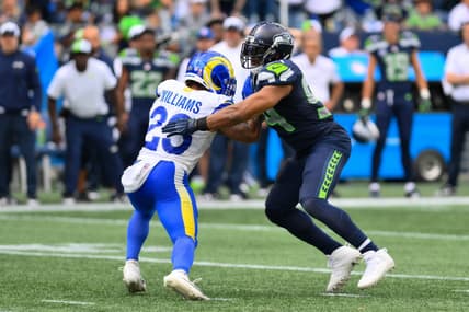 Sep 10, 2023; Seattle, Washington, USA; Los Angeles Rams running back Kyren Williams (23) blocks Seattle Seahawks linebacker Bobby Wagner (54) during the second half at Lumen Field. Mandatory Credit: Steven Bisig-USA TODAY Sports