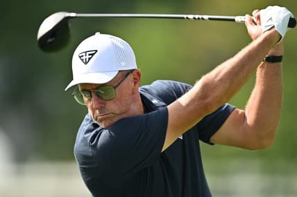 Sep 22, 2023; Sugar Grove, Illinois, USA; Phil Mickelson hits balls on the range during the first round of the LIV Golf Chicago golf tournament at Rich Harvest Farms. Mandatory Credit: Jamie Sabau-USA TODAY Sports