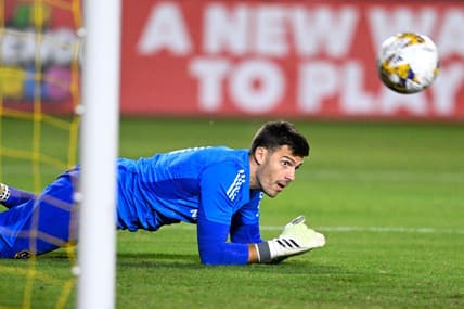 Sep 30, 2023; Carson, California, USA; LA Galaxy goalkeeper Jonathan Bond (1) watches as Portland Timbers forward Santiago Moreno (30) scores a goal during the first half at Dignity Health Sports Park. Mandatory Credit: Kelvin Kuo-USA TODAY Sports