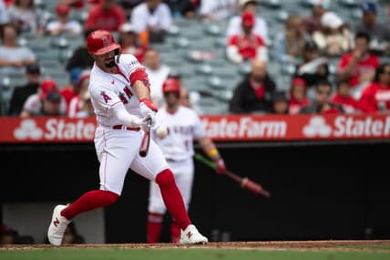 Oct 1, 2023; Anaheim, California, USA; Los Angeles Angels left fielder Randal Grichuk (15) hits a home run against the Oakland Athletics during the third inning at Angel Stadium. Mandatory Credit: Jonathan Hui-USA TODAY Sports