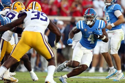 Sep 30, 2023; Oxford, Mississippi, USA; Mississippi Rebels running back Quinshon Judkins (4) runs the ball  during the first half against the LSU Tigers at Vaught-Hemingway Stadium. Mandatory Credit: Petre Thomas-USA TODAY Sports