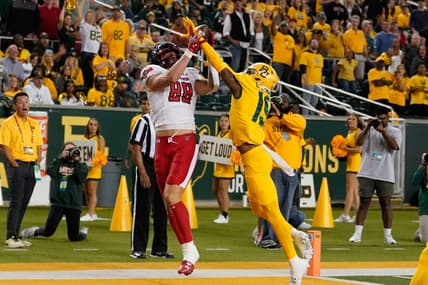 Oct 7, 2023; Waco, Texas, USA; Texas Tech Red Raiders tight end Baylor Cupp (88) makes a touchdown catch against Baylor Bears cornerback Caden Jenkins (19) during the first half at McLane Stadium. Mandatory Credit: Chris Jones-USA TODAY Sports