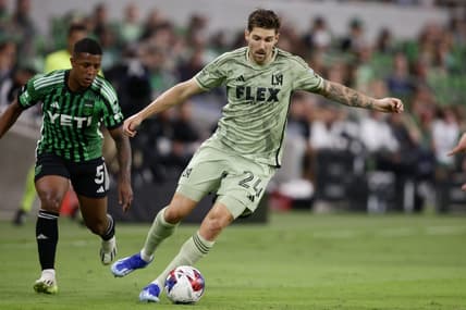 Oct 7, 2023; Austin, Texas, USA; Los Angeles FC midfielder Ryan Hollingshead (24) dribbles the ball during the first half at Q2 Stadium. Mandatory Credit: Erich Schlegel-USA TODAY Sports