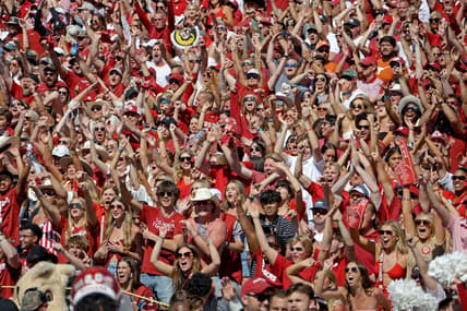 Oklahoma fans cheer during the Red River Rivalry college football game between the University of Oklahoma Sooners (OU) and the University of Texas (UT) Longhorns at the Cotton Bowl in Dallas, Saturday, Oct. 7, 2023. Oklahoma won 34-30.