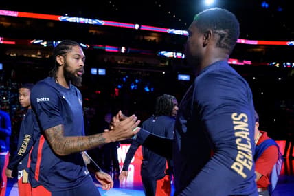 Oct 10, 2023; New Orleans, Louisiana, USA; New Orleans Pelicans forward Brandon Ingram, left, greets New Orleans Pelicans forward Zion Williamson during introductions before a game against the Orlando Magic at the Smoothie King Center. Mandatory Credit: Matthew Hinton-USA TODAY Sports