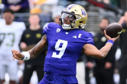 Oct 14, 2023; Seattle, Washington, USA; Washington Huskies quarterback Michael Penix Jr. (9) passes the ball against the Oregon Ducks during the first half at Alaska Airlines Field at Husky Stadium. Mandatory Credit: Steven Bisig-USA TODAY Sports
