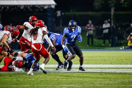 Oct 14, 2023; Durham, North Carolina, USA; Duke Blue Devils running back Jordan Waters (7) runs with the football during the first half of the game against North Carolina State Wolfpack at Wallace Wade Stadium. Mandatory Credit: Jaylynn Nash-USA TODAY Sports
