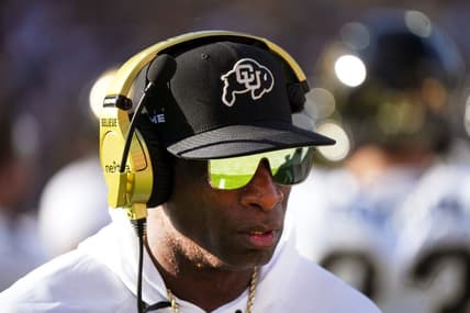 Deion Sanders walks the sidelines as the Colorado plays Arizona State at Mountain America Stadium.