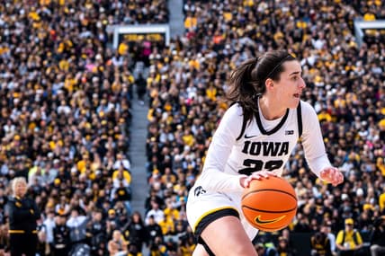 Iowa guard Caitlin Clark (22) drives to the basket during Crossover at Kinnick at Kinnick Stadium on Sunday, October 15, 2023 in Iowa City.