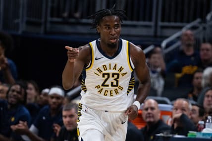 Oct 16, 2023; Indianapolis, Indiana, USA; Indiana Pacers forward Aaron Nesmith (23) celebrates a made three point basket in the second quarter against the Atlanta Hawks at Gainbridge Fieldhouse. Mandatory Credit: Trevor Ruszkowski-USA TODAY Sports