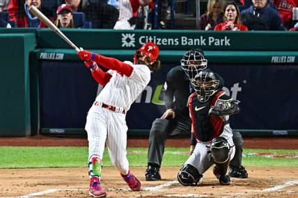 Oct 16, 2023; Philadelphia, Pennsylvania, USA; Philadelphia Phillies first baseman Bryce Harper (3) hits a solo home run during the first inning against the Arizona Diamondbacks in game one of the NLCS for the 2023 MLB playoffs at Citizens Bank Park. Mandatory Credit: Kyle Ross-USA TODAY Sports