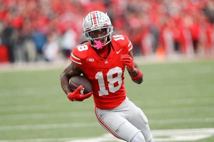 Oct 21, 2023; Columbus, Ohio, USA;  Ohio State Buckeyes wide receiver Marvin Harrison Jr. (18) scores a touchdown against the Penn State Nittany Lions during the fourth quarter at Ohio Stadium. Mandatory Credit: Joseph Maiorana-USA TODAY Sports