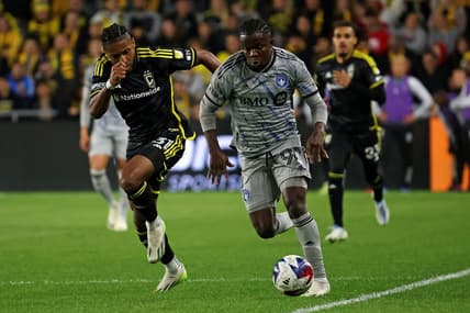 Oct 21, 2023; Columbus, Ohio, USA; CF Montreal forward Kwadwo Opoku (90) controls the ball against Columbus Crew defender Steven Moreira (31) during the second half at Lower.com Field. Mandatory Credit: Trevor Ruszkowski-USA TODAY Sports