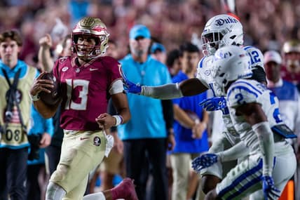 Florida State Seminoles quarterback Jordan Travis (13) runs out of bounds. The Florida State Seminoles defeated the Duke Blue Devils 38-20 on Saturday, Oct. 21, 2023.