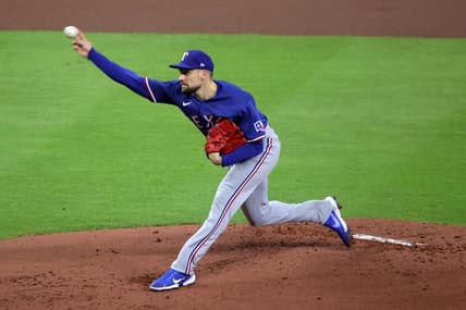 Oct 22, 2023; Houston, Texas, USA; Texas Rangers starting pitcher Nathan Eovaldi (17) throws a pitch against the Houston Astros in the first inning during game six of the ALCS for the 2023 MLB playoffs at Minute Maid Park. Mandatory Credit: Erik Williams-USA TODAY Sports