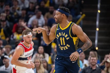 Oct 25, 2023; Indianapolis, Indiana, USA; Indiana Pacers forward Bruce Brown (11) celebrates a made three point basket in the second quarter against the Washington Wizards at Gainbridge Fieldhouse. Mandatory Credit: Trevor Ruszkowski-USA TODAY Sports